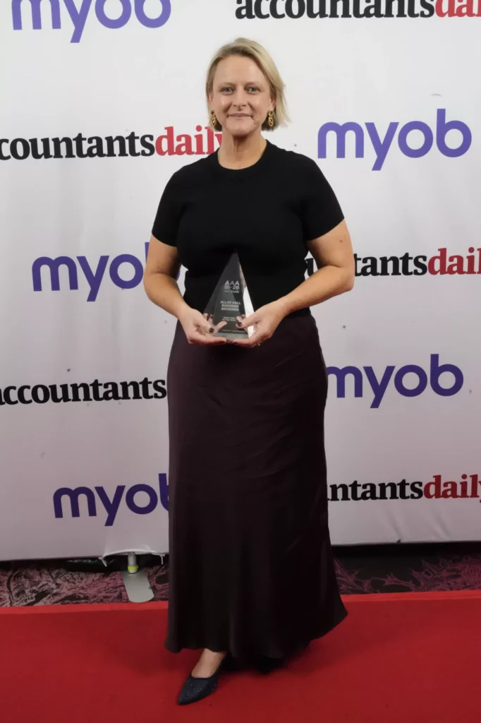 Nicole Woolley holds AAA SMSF Firm of the Year trophy
